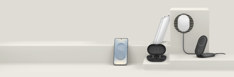 Collection of Samsung accessories by Belkin, including a screen protector, headphones, power banks, a magnetic car charger, and foldable wireless chargers, displayed on a neutral platform with a minimalist design.